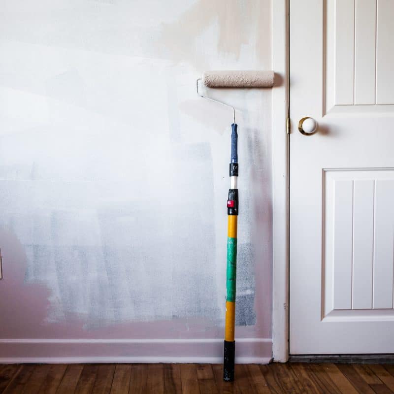 paint-roller-on-the-wall-scaled-1